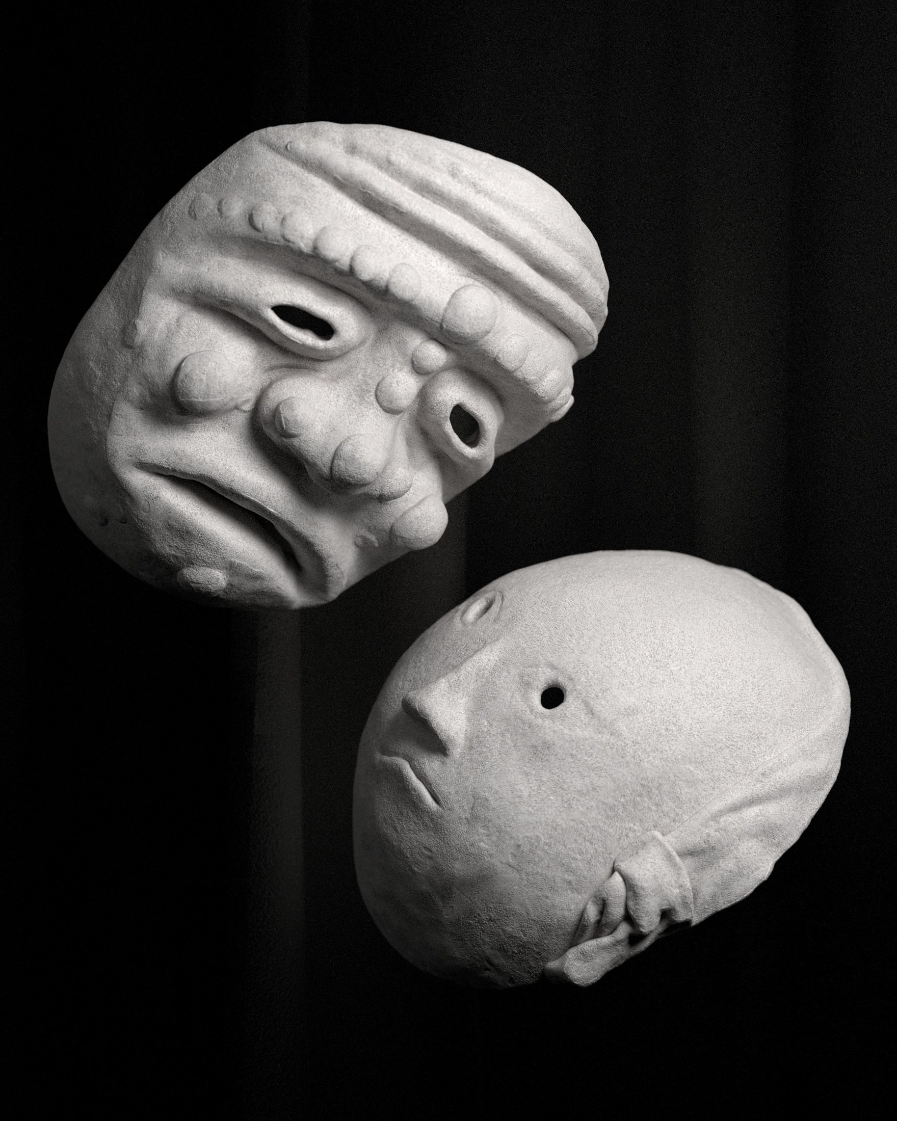 Two masks — plaster, clay, houdini, cops, type by Mathieu Missiaen